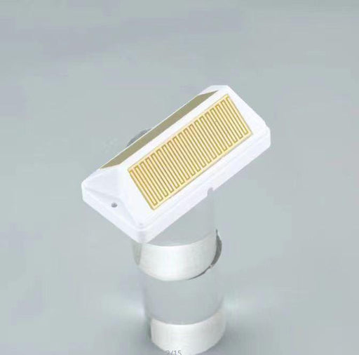A Bon Pergola Rain Sensor for Villa Pergola - Add-Ons Only on top of a silver plate.