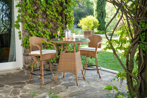 A Tortuga Outdoor Sea Pines 3-Piece Wicker Bar Set - Java or Mojave featuring a durable construction and seating set.