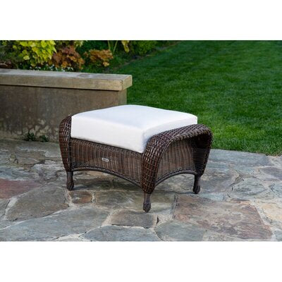 The ottoman of the Tortuga Outdoor Sea Pines 3-Piece Outdoor Wicker Seating Set - Java