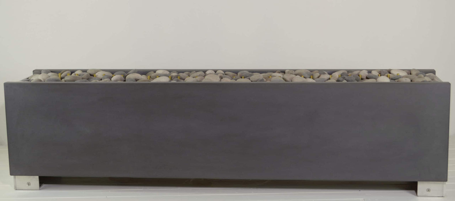 Sleek Single-Stack Solus Decor Linear Fire Pit with Stone Filling.