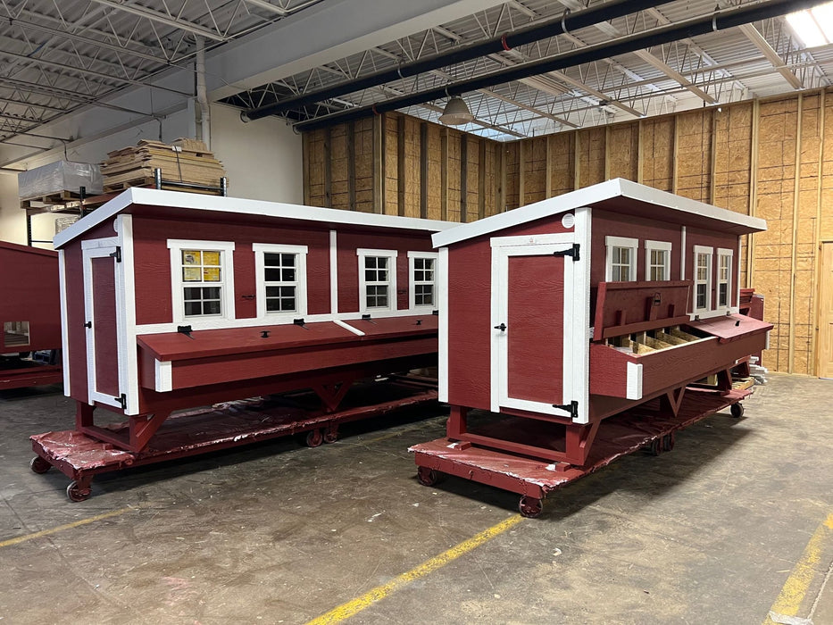 Pair of OverEZ Jumbo Chicken Coops, in red and white, ready for shipment, ideal for raising a large flock of up to 30 chickens each.