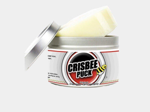 Open container of Crisbee Original Seasoning Puck revealing the solid puck, emphasizing the ready-to-use nature of the grill seasoning product.