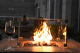 Elementi Bar Table closer look of rocks on fire