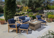 A Tortuga Outdoor 6-Piece Indonesian Teak Loveseat and Fire Table Set - Canvas Natural or Navy with blue cushions made of durable construction.