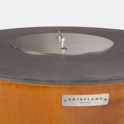 An Arteflame Classic Grill with a Stainless Steel Center Lid on top.
