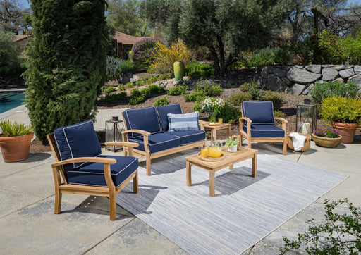 Tortuga Outdoor 5-Piece Indonesian Teak Loveseat Set - Sunbrella Canvas Natural or Navy by Tortuga Outdoor, featuring durable construction and blue cushions for a teak patio furniture set.