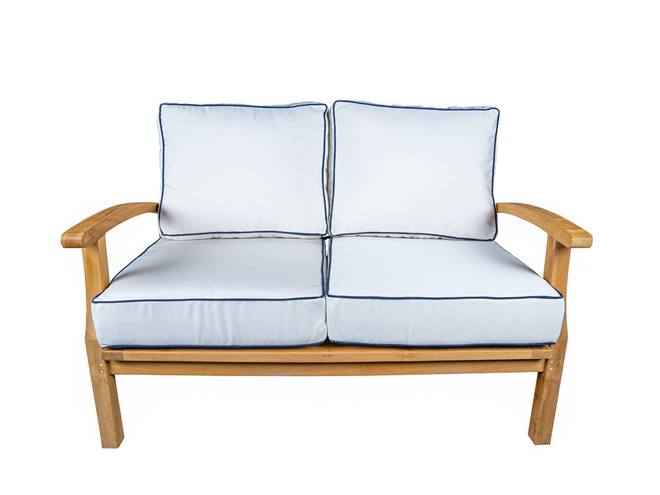A luxury retreat with a Tortuga Outdoor 6-Piece Indonesian Teak Loveseat and Fire Table Set - Canvas Natural or Navy.
